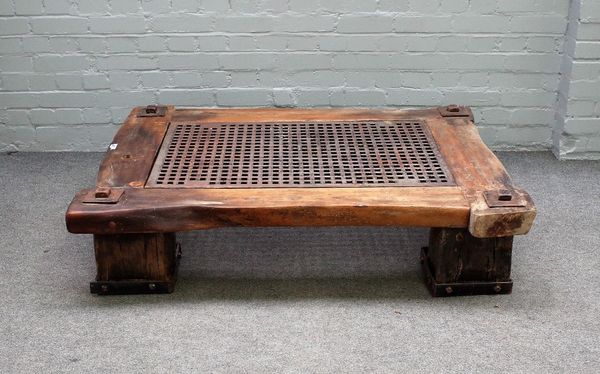 Paul Soden; a modern rectangular reclaimed wood coffee table, with inset metal grille panel, 130cm wide x 30cm high.