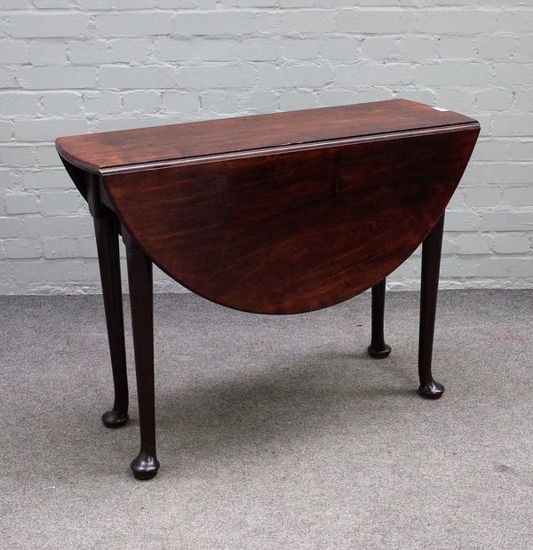 A mid-18th century mahogany oval drop flap dining table, on pad feet, 97cm wide x 71cm high.,