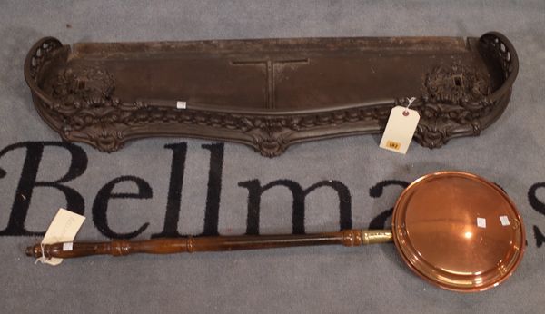 A Victorian style wrought iron serpentine fire guard, 110cm wide and a 19th century copper warming pan, 100cm long, (2).   C5