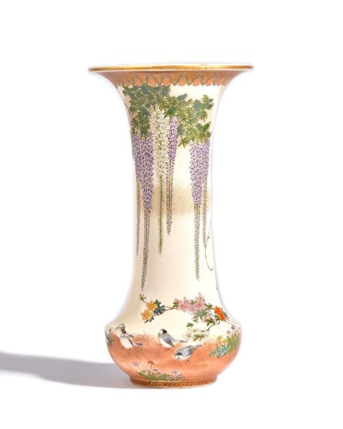 A Japanese Satsuma vase, Meiji period, the squat lower body painted with birds amongst flowering shrubs, beneath a tall neck painted with branches of