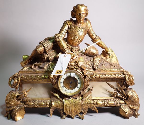 An early 20th century gilt brass mantel clock with finial formed as recumbent knight, on bracket feet, 60cm wide x 52cm high, (one pendulum).  C4