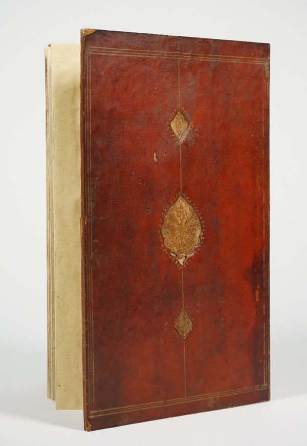 A concertina album of six pages of Persian couplets in nasta'liq calligraphy on gold-sprinkled paper, dated 1297/1880, 23.2cm. by 14cm., red leather b