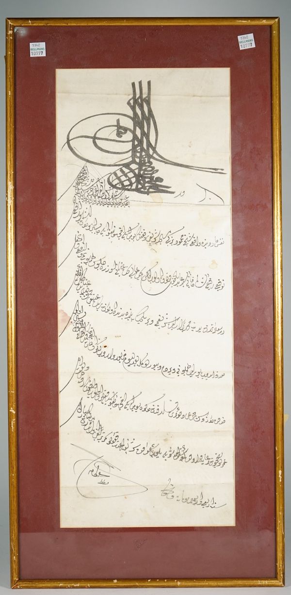 An Ottoman firman bearing the tughra of Sultan Mahmud I ( r. 1730-54), eight lines of Diwani script in black ink on paper, dated 1144/1731-32, 53cm. b