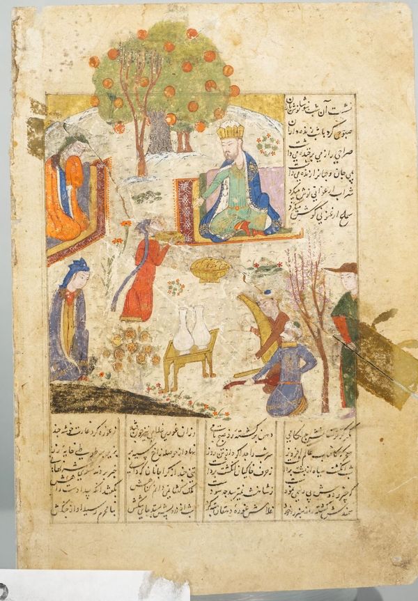 A Timurid miniature on paper, Iran, mid 15th century, painted with a king and attendants with rows of black script, overall size 22cm. by 15.5cm., per