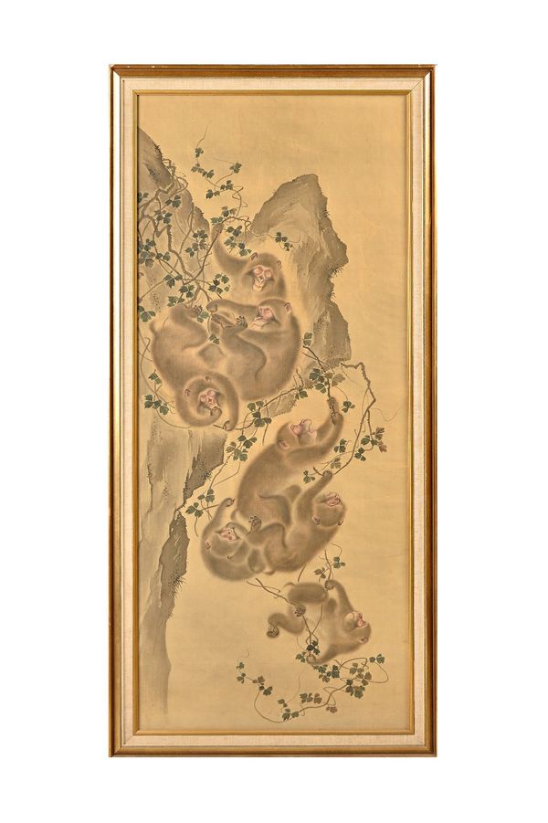 Japanese school, Meiji period, a large painted on silk of seven monkeys on branches beside a rocky outcrop, 127cm. by 54cm., framed and glazed. 25