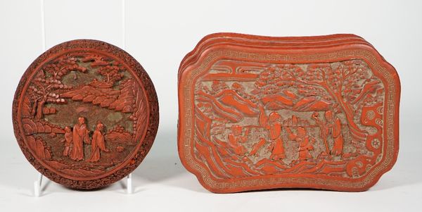 A Chinese cinnabar lacquer circular box and cover, Qing dynasty, each carved with three figures in a landscape inside floral borders, 13cm. diameter;