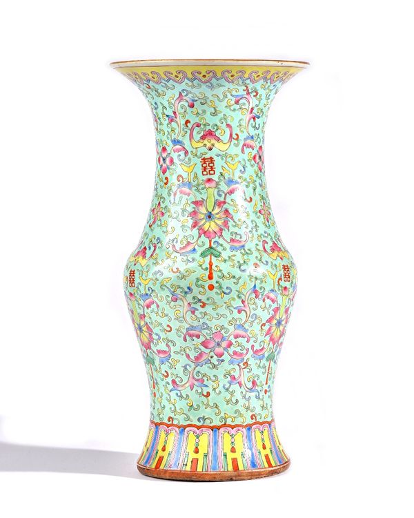 A Chinese famille-rose baluster vase, 19th century, painted with lotus flowers, tendrils, bats and characters against a pale turquoise ground, 36.5cm.