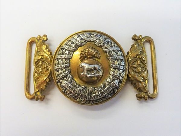 A Royal Munster Fusiliers Officer's waist belt buckle, 1881-1910, formed as a central grenade with a tiger, in a wreath surround, detailing Battle Hon