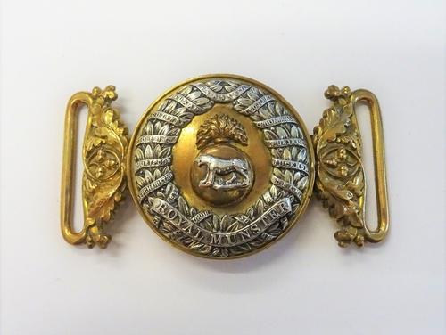 A Royal Munster Fusiliers Officer's waist belt buckle, 1881-1910, formed as a central grenade with a tiger, in a wreath surround, detailing Battle Hon