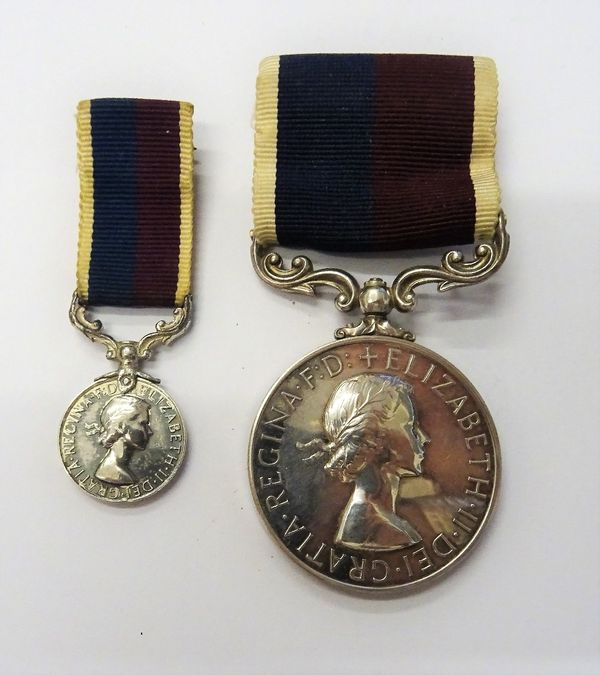 A Royal Air Force Long Service and Good Conduct medal, Elizabeth II issue to FG. OFF. J.A.RAY R.A.F. with the original cardboard box, also the corresp