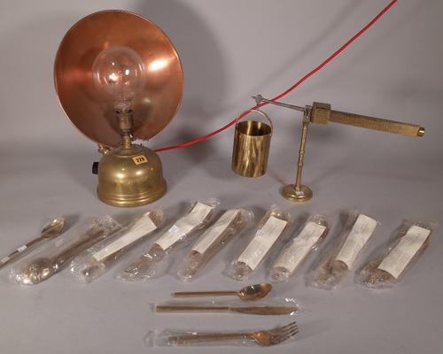 'Tilley Radiators, England', an early 20th century brass heat lamp, 29cm wide x 42cm high and a quantity of bronzeware flatware. S1T