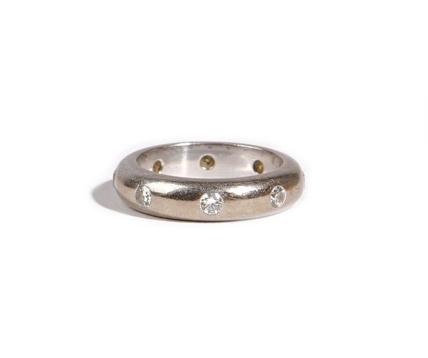 A Theo Fennell white gold and diamond set full eternity ring, mounted with circular cut diamonds, with Theo Fennell mark only, ring size M, gross weig