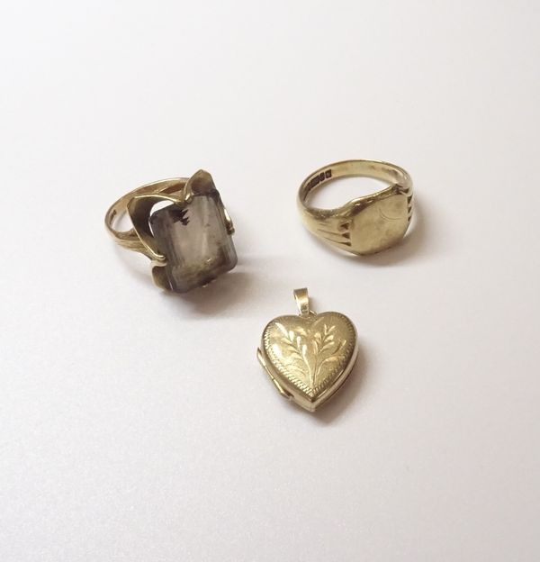 A 9ct gold signet ring, Birmingham 1962, ring size Q and a half, a 9ct gold ring, claw set with a rectangular step cut smoky quartz, ring size Q and a