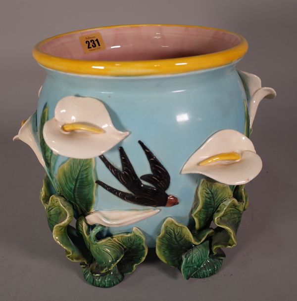 A Victorian style ceramic jardiniere with moulded floral decoration, 23cm wide x 27cm high.  D1