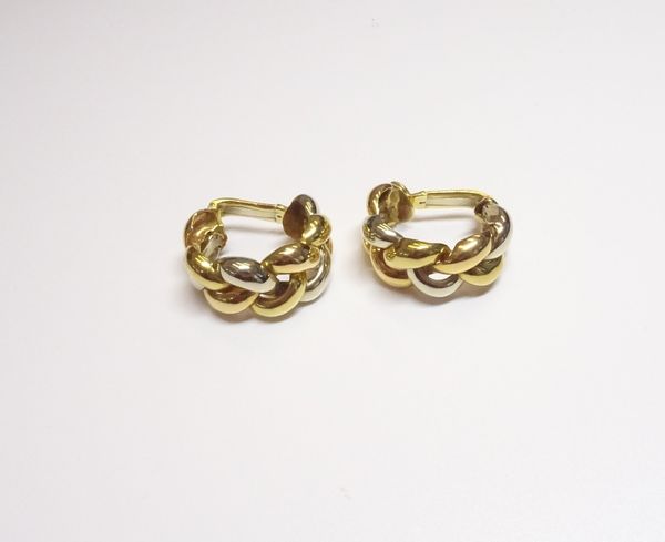 A Poiray pair of two colour gold earclips, each of curved plaited design, details Poiray 750, gross weight 24.6 gms.