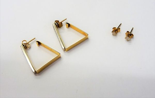 A pair of gold and diamond single stone earstuds, each claw set with a circular cut diamond, the backs with post and butterfly clip fittings and a pai