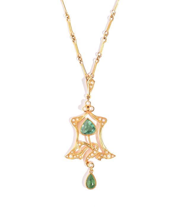 A gold, seed pearl and pale green gem set pendant, pierced in an Art Nouveau openwork design, detailed 15 CT, with a gold bar link neckchain, detailed