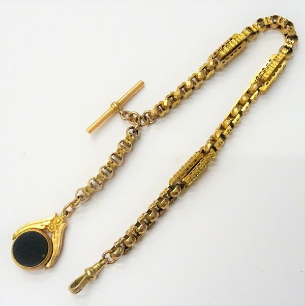 A Victorian gold watch Albert chain, in a decorated twin bar, star pierced and faceted circular link design, detailed 9 C, fitted with a swivel, detai