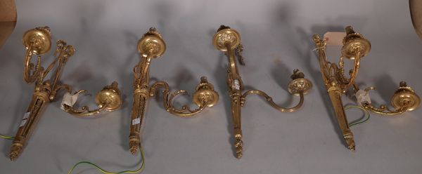 A set of three Victorian style two branch wall appliques, with ribbon tied crest, 27cm wide x 42cm long and another similar, (4) S1M