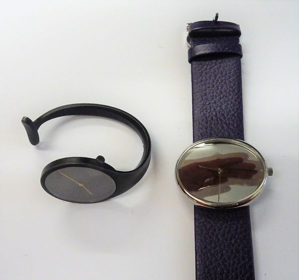 AFTERSALE. A Georg Jensen lady's bangle watch, having a blackened finish, the plain black dial with gilt hands, detailed to the caseback, Georg Jensen