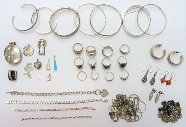 Mostly silver jewellery, comprising; twelve rings, ten pendants and lockets, seven bangles, four bracelets, four pairs of earrings and sixteen necklac