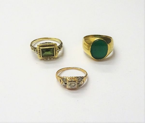 A gold ring, mounted with five small circular cut diamonds, a gold and stained green agate set oval signet ring, detailed 585 and a gold and pale gree