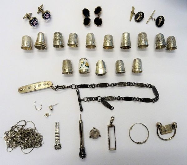 A collection of fifteen silver thimbles, in a variety of designs, including one having floral enamelled decoration, three pairs of cufflinks, a silver