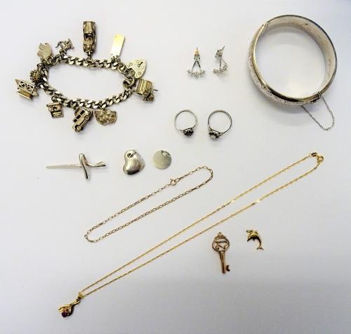 A gold, pink and colourless gem set pendant, detailed 750, with a gold neckchain, on a boltring clasp, detailed 750, gross weight 3.6 gms, further mos