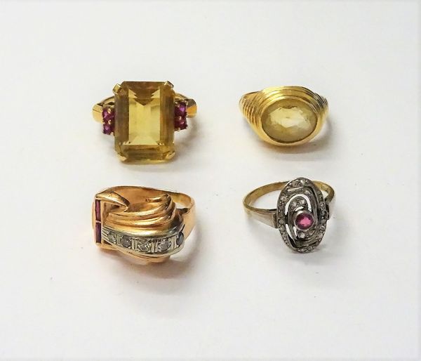 A gold, diamond and synthetic ruby set cocktail ring, in a curved design, a gold ring, claw set with a rectangular step cut citrine between synthetic