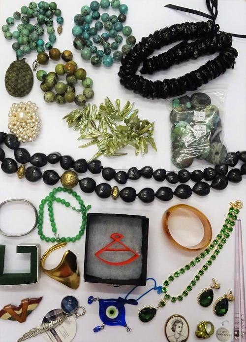 A collection of costume jewellery, including turquoise matrix beads, further bead and other necklaces, a gilt bangle, further bangles, an imitation pe