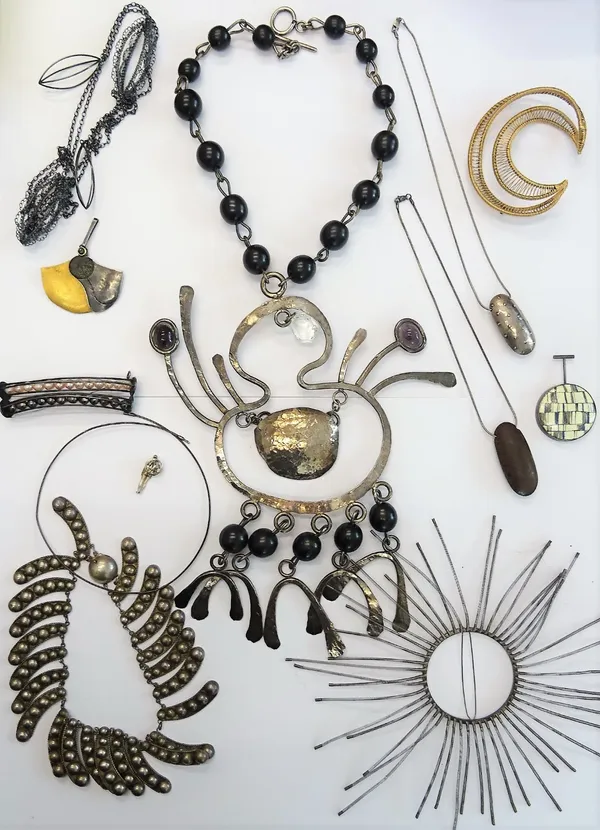 A group of mostly modern studio jewellery, comprising; a circular hair ornament, with radiating wirework springs, a black bead collar necklace, detail