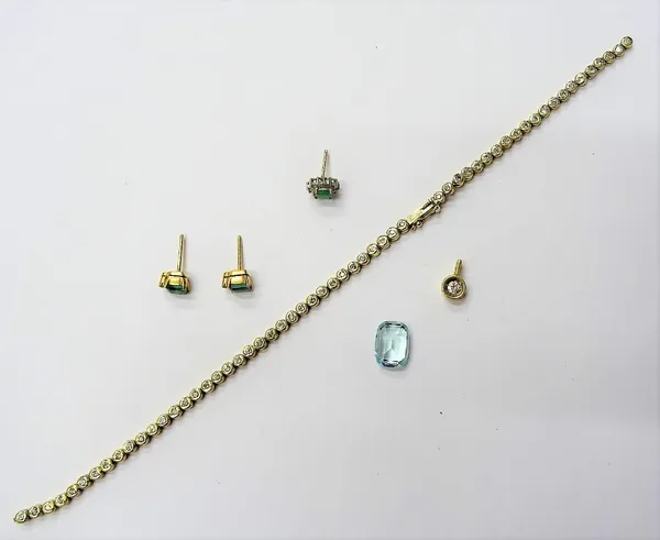 A gold and diamond set bracelet, mounted with a row of circular cut diamonds, on a snap clasp, detailed 585 (broken), length 19cm, a pair of emerald a