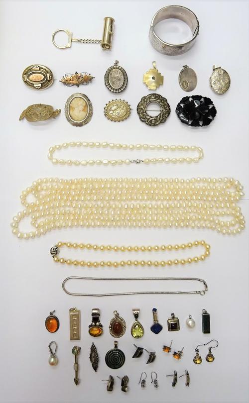 Two long single row necklaces of freshwater cultured pearls, another single row necklace of freshwater cultured pearls, a single row necklace of imita