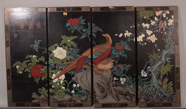 Four Chinese lacquer rectangular hanging panels, decorated with birds amongst flowering shrubs, each panel 92cm x 38cm.(4). CAB