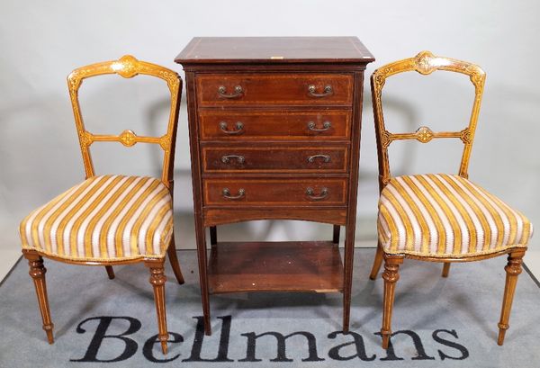 An Edwardian inlaid mahogany four drawer folio stand, 53cm wide x 92cm high and a pair of Edwardian stained beech side chairs, 43cm wide x 86cm high,