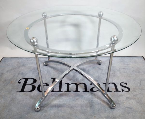 A 20th century glass circular dining table on chrome base, united by 'X' frame stretcher, 89cm diameter x 77cm high.   C5