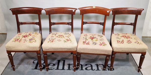 A set of four 19th century mahogany framed bar back dining chairs, on octagonal turned supports, 47cm wide x 86cm high, (4).   C5