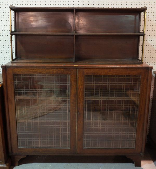 A late Victorian mahogany and brass mounted chiffonier with glazed panelled doors on bracket feet, 135cm wide x 155cm high.  E5