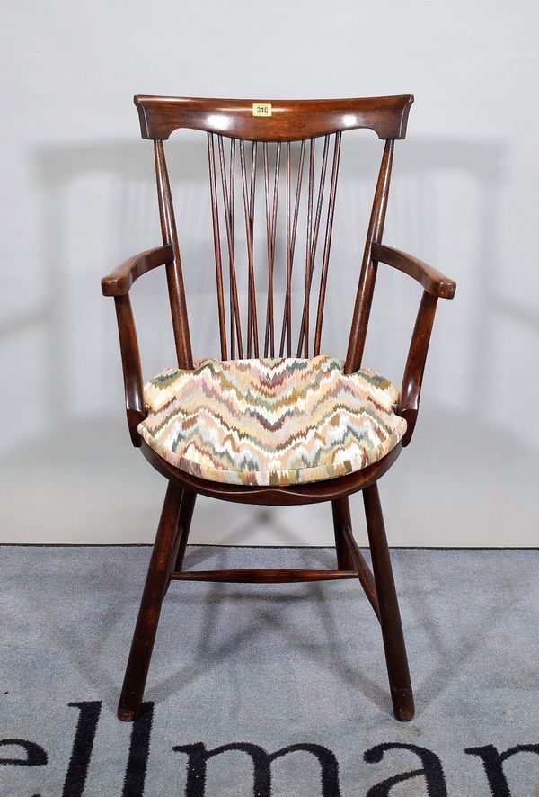 An early 20th century stained beech stickback open armchair, 49cm wide x 89cm high.   C3