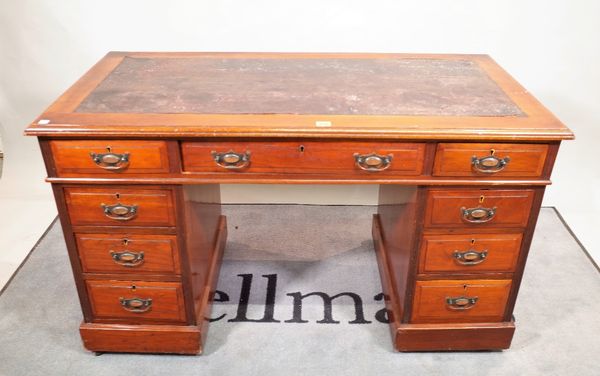 An early 20th century mahogany pedestal desk with nine drawers about the knee, 129cm wide x 76cm high.  D1