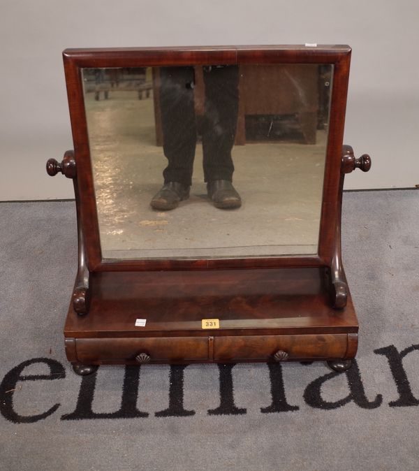 A William IV walnut two drawer toilet mirror on bun feet, 54cm wide x 61cm high.  E3