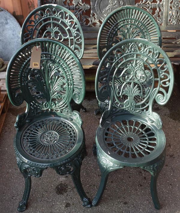 A matched set of four 20th century green painted metal garden chairs, 36cm wide x 82cm high, (4).  OUT