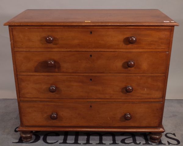 A Victorian mahogany chest of four long graduated drawers, on turned feet, 107cm wide x 91cm high.  E5