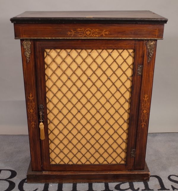 A Victorian marquetry inlaid walnut pier cabinet, with single brass grille door, on plinth base, 77cm wide x 100cm high.  E2