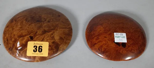 Two Chinese burlwood large buttons, Qing dynasty, probably 19th century, each with attractive grain and warm colour, 10cm and 11.5cm diameter, (2).