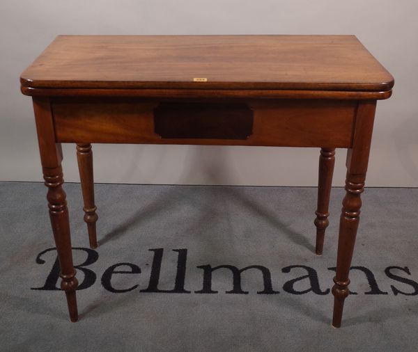 A Victorian mahogany tea table on turned supports, 91cm wide x 77cm high.  B1