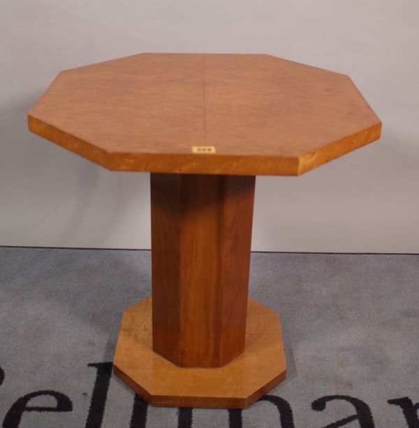 A mid-20th century Art Deco birdseye maple and walnut octagonal occasional table on plinth base, 57cm wide x 59cm high.   C5