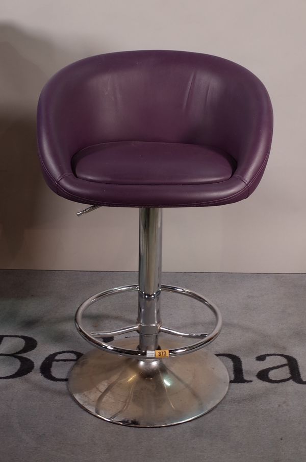 A 20th century chrome and purple leather adjustable bar stool, 53cm wide x 83cm high.  B1