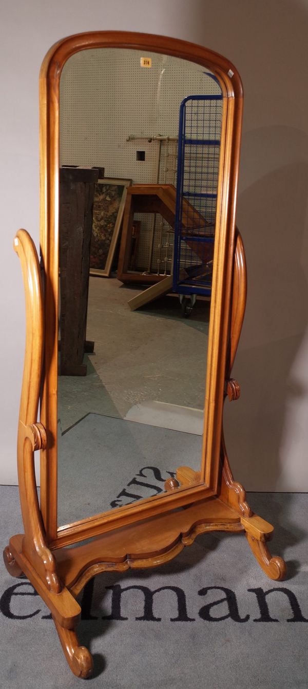 A late Victorian walnut framed floor standing cheval mirror, 73cm wide x 155cm high.  B3