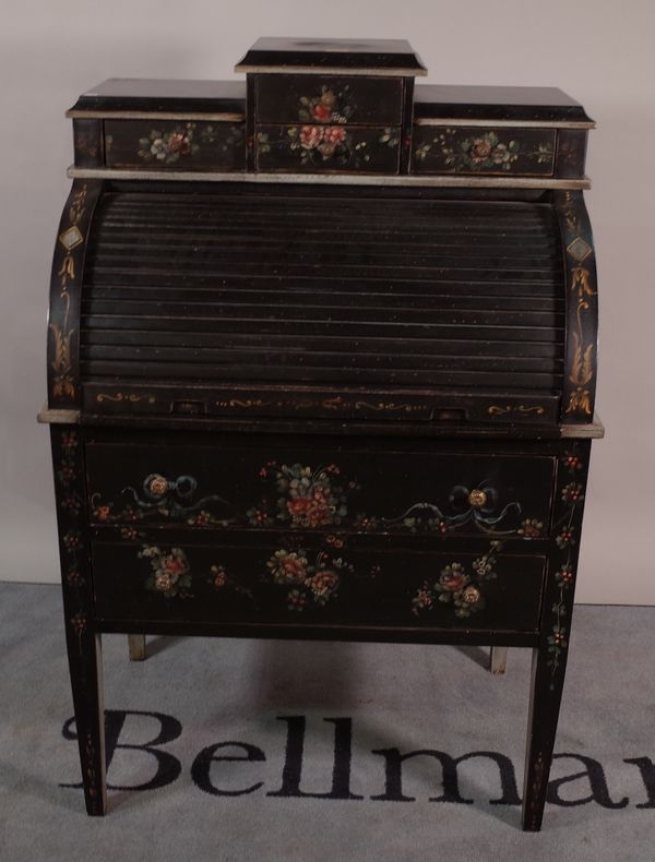 A Regency style ebonised and polychrome painted roll top dressing chest with two long drawers.  B3